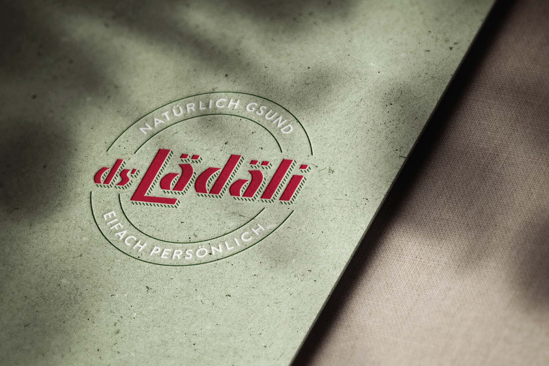 Embossed logo on paper of ds Lädäli