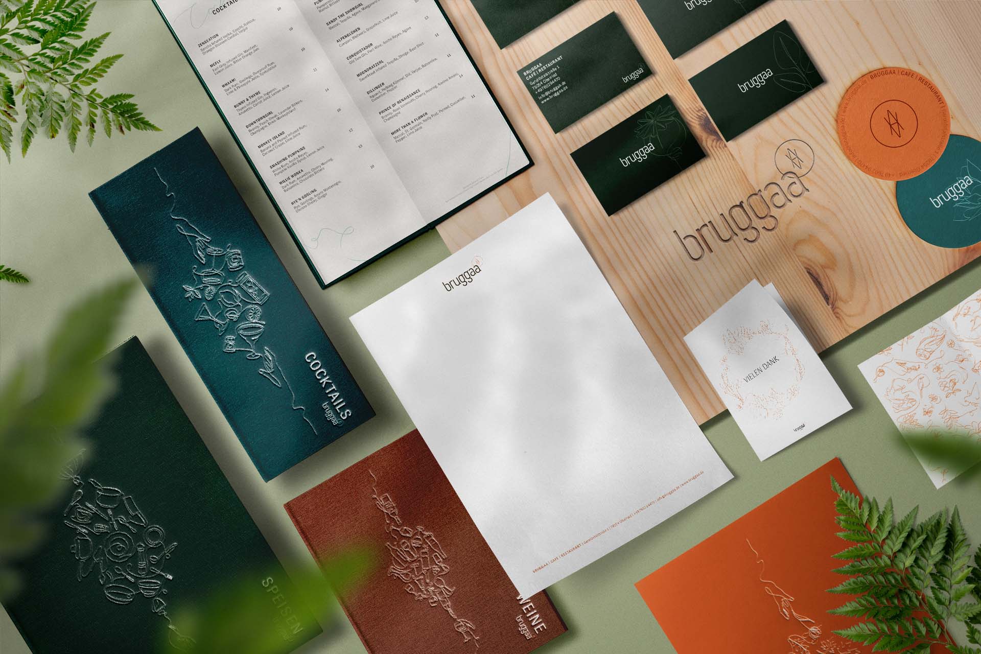 modern and elegant restaurant stationary set showcasing logo, menus, coasters, and business cards.