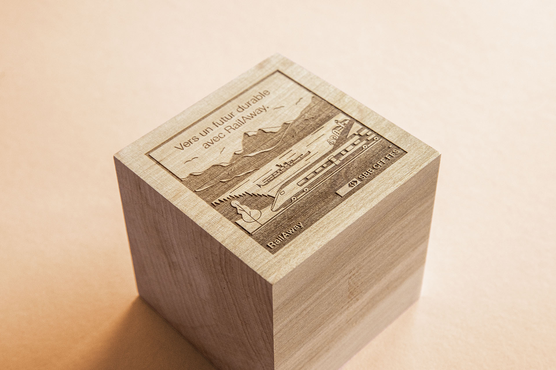 engraved illustration on wooden plant cube