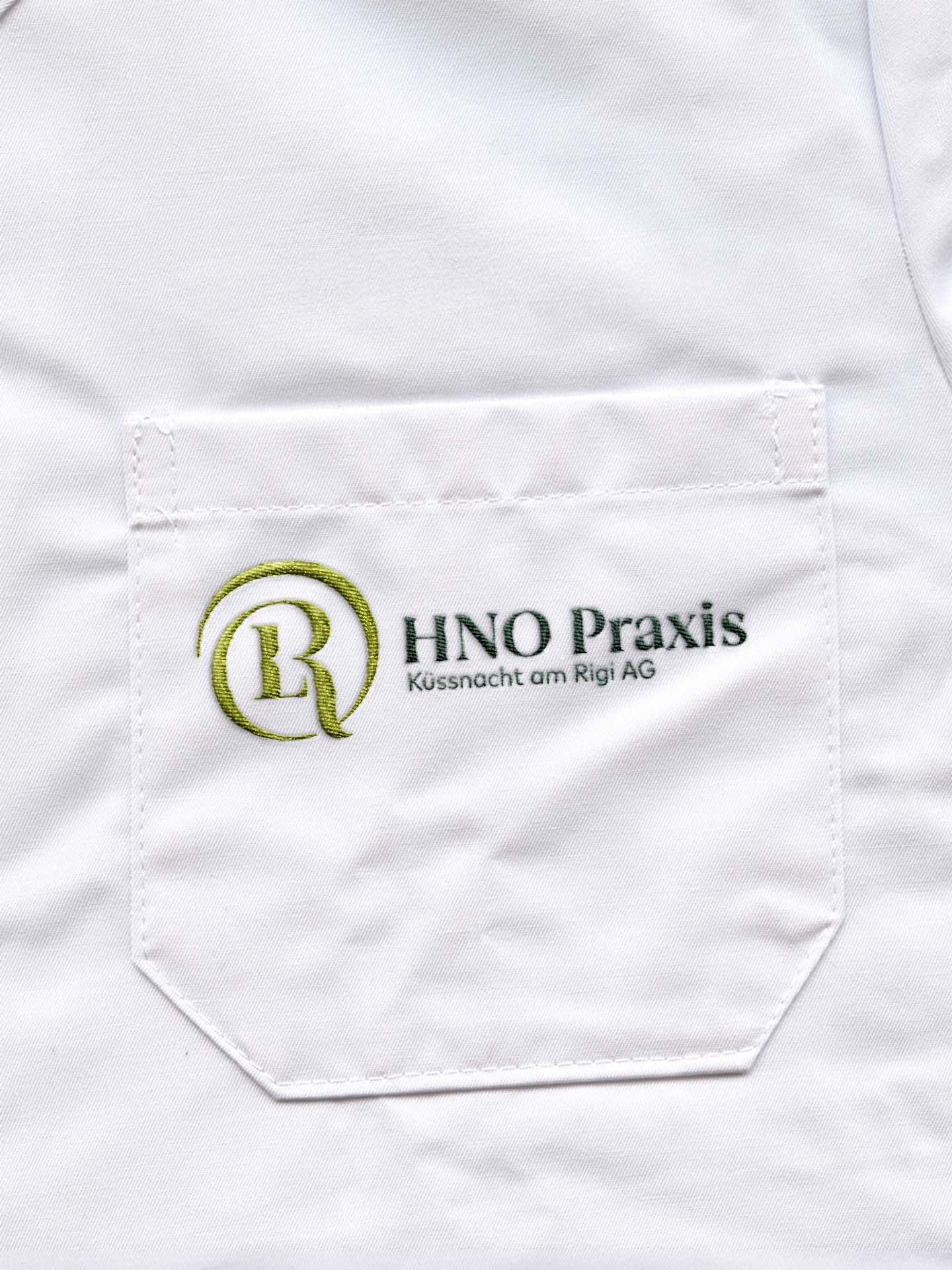White coat with embroidered logo design for HNO Praxis Küssnacht am Rigi AG