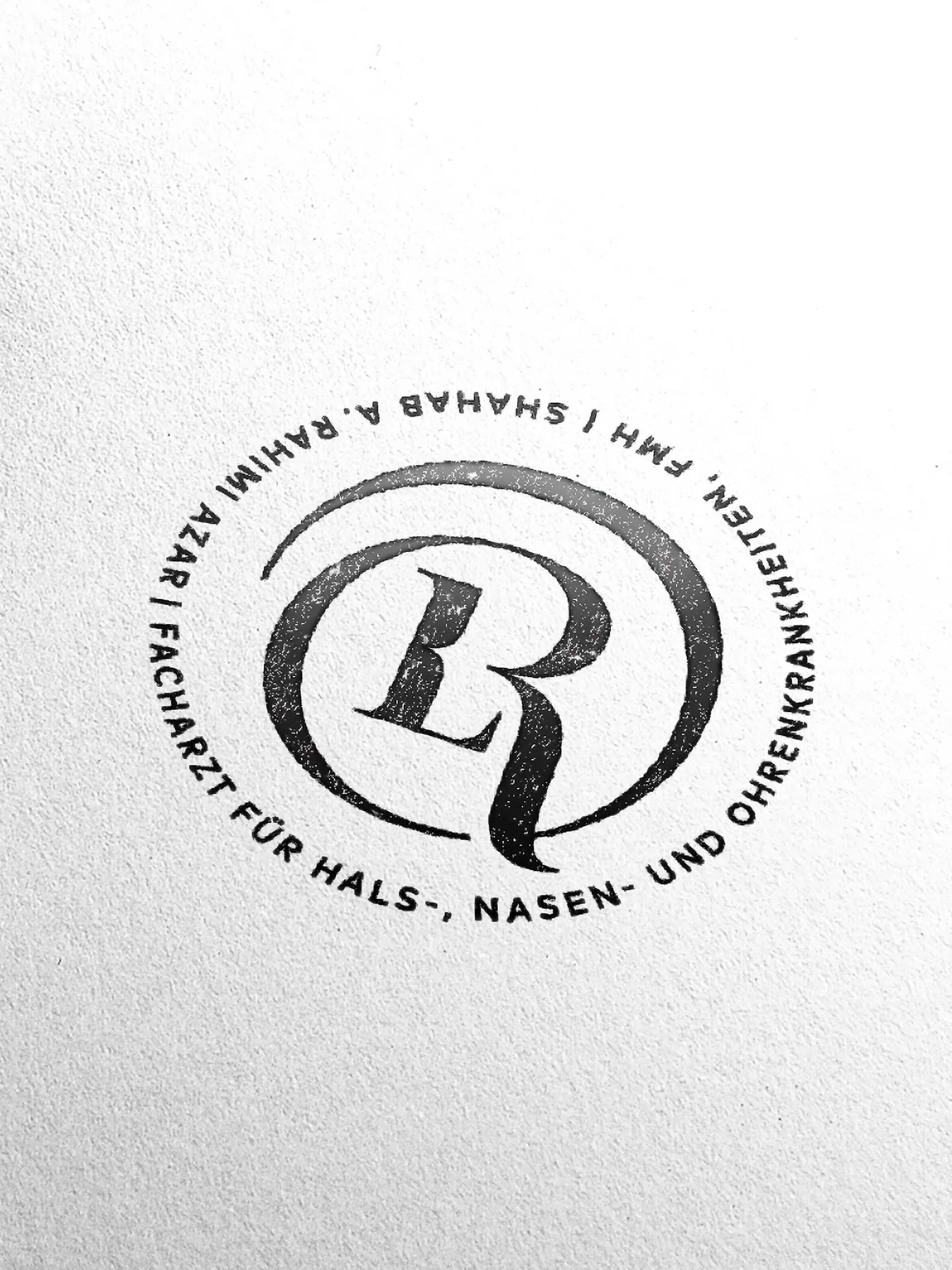 Rubber stamp logo visual for HNO Praxis Küssnacht am Rigi AG