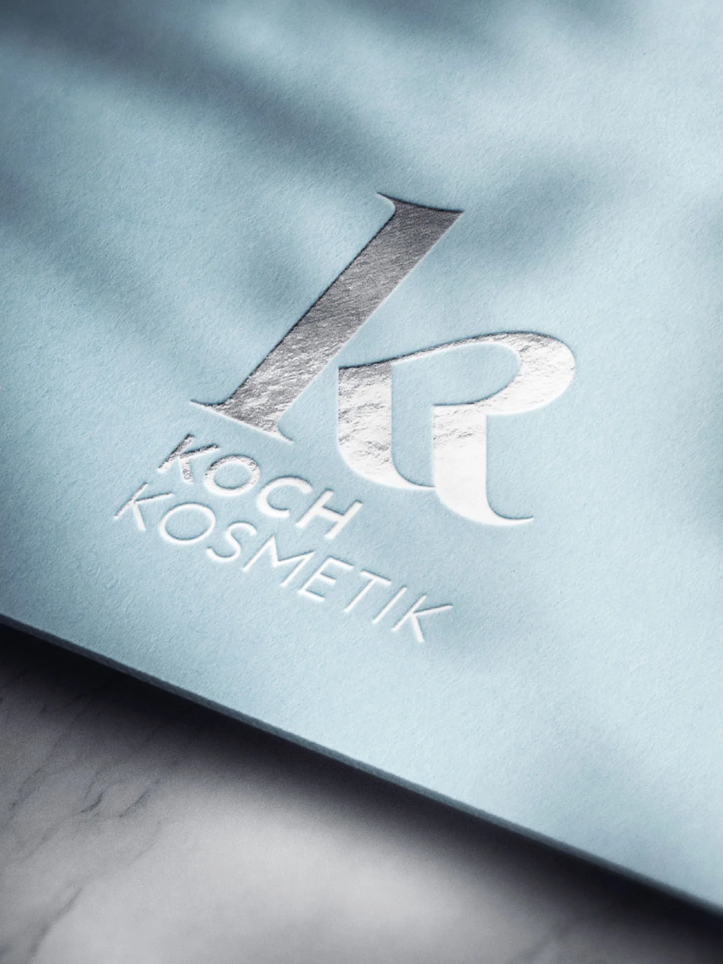 Hot foil logo of Koch Kosmetik